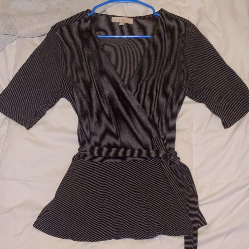 Quarter sleeve wrap blouse